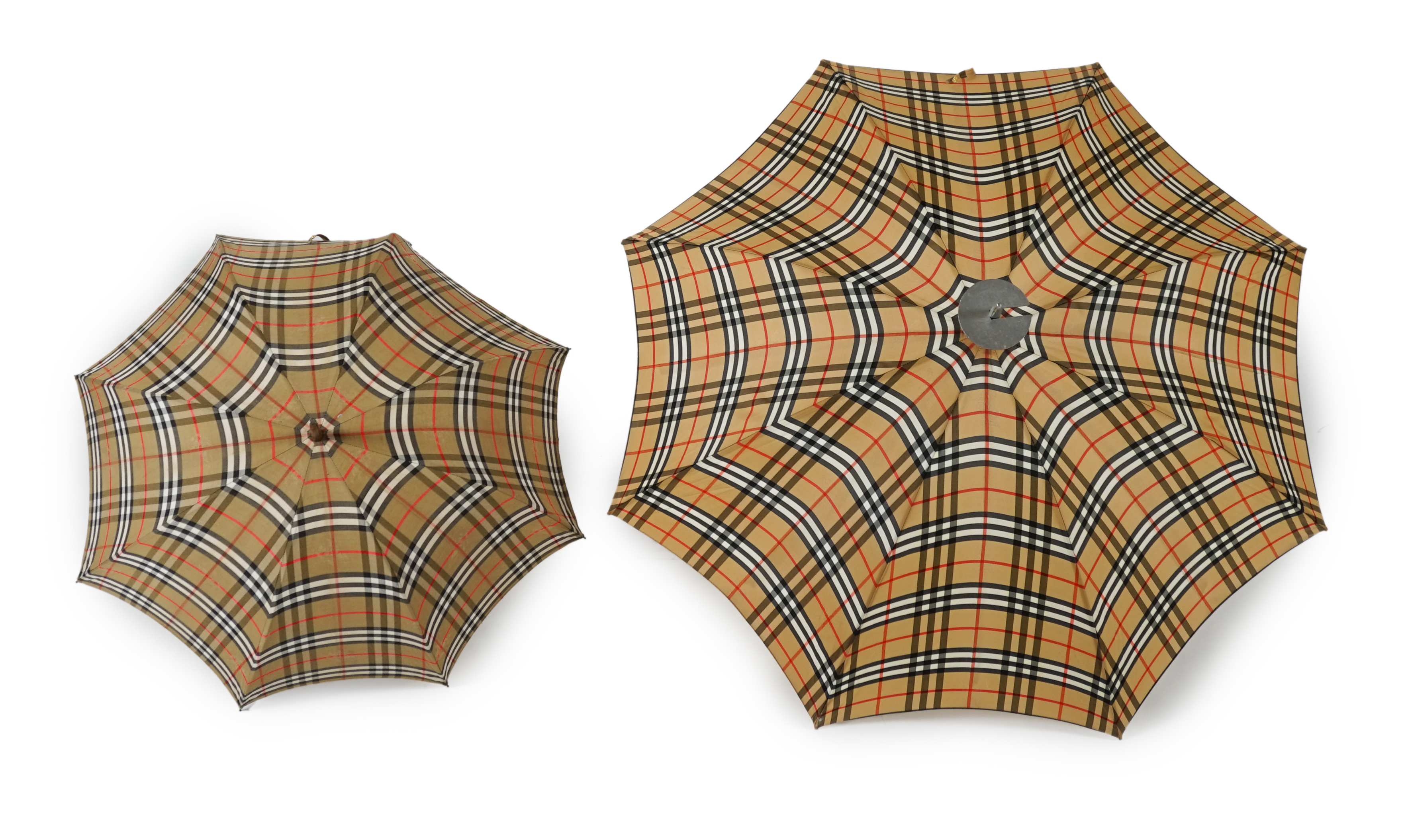 A vintage Burberry shooting stick umbrella and a lady's vintage cotton umbrella, shooting stick height 91cm, umbrella 83cm